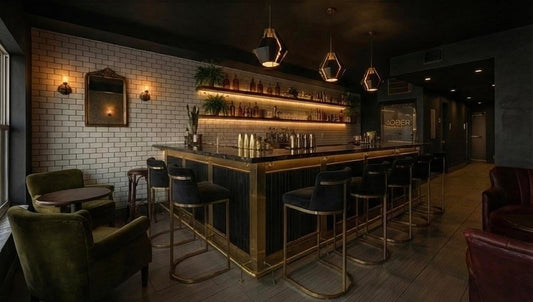 Interior of Sober Bar in Gulfport Florida featuring a moody zero-proof cocktail bar, lounge seating, gold accents, and speakeasy-style atmosphere