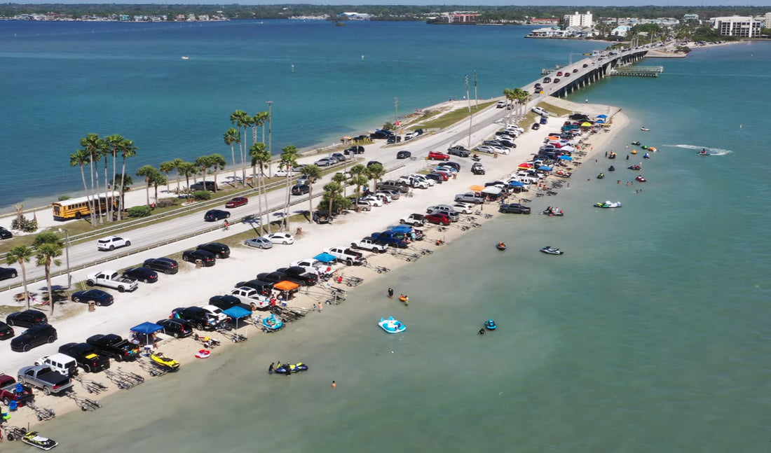 Aerial view of the Dunedin Causeway shoreline crowded with Jet Skis and motorized watercraft before Dunedin banned launches from the south side.