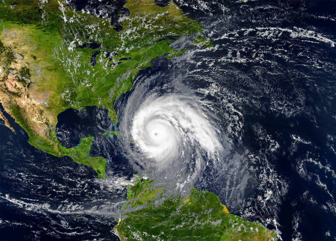 Satellite image of powerful Atlantic hurricane swirling near Florida and the Caribbean showing large storm system during hurricane season