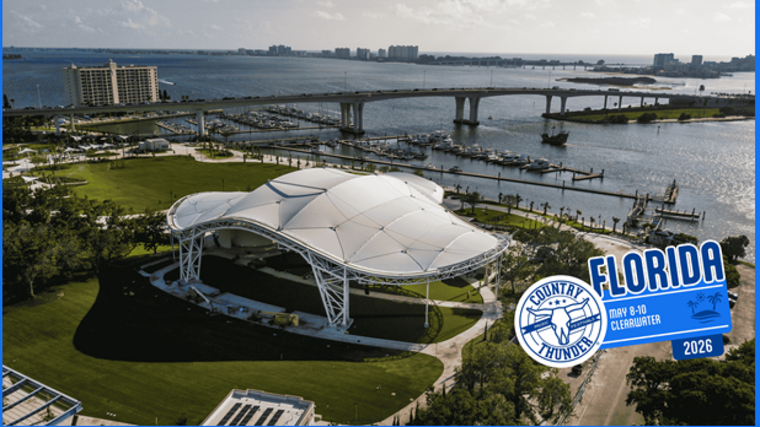 Aerial view of Coachman Park in Clearwater Florida with waterfront amphitheater and bridge, future location of Country Thunder music festival after moving from St Pete Beach