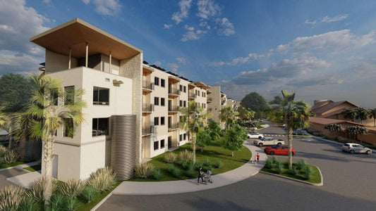 Rendering of Palm Lake Urban Sanctuary affordable apartment community in St. Petersburg Florida featuring four story residential buildings and income restricted housing units.