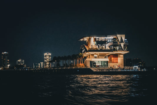 St Pete Pier illuminated at night along Tampa Bay in St Petersburg Florida, representing Florida’s coastline, tourism industry, and the coastal environment at the center of offshore drilling debate.