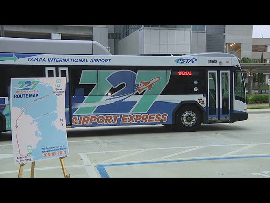 PSTA 727 Airport Express bus at Tampa International Airport, offering $2.25 rides between Downtown St. Petersburg and TPA with convenient daily service across Tampa Bay.
