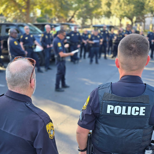Tampa Police Department officers gathered during a 2025 safety briefing as new crime statistics show a 21% citywide crime drop