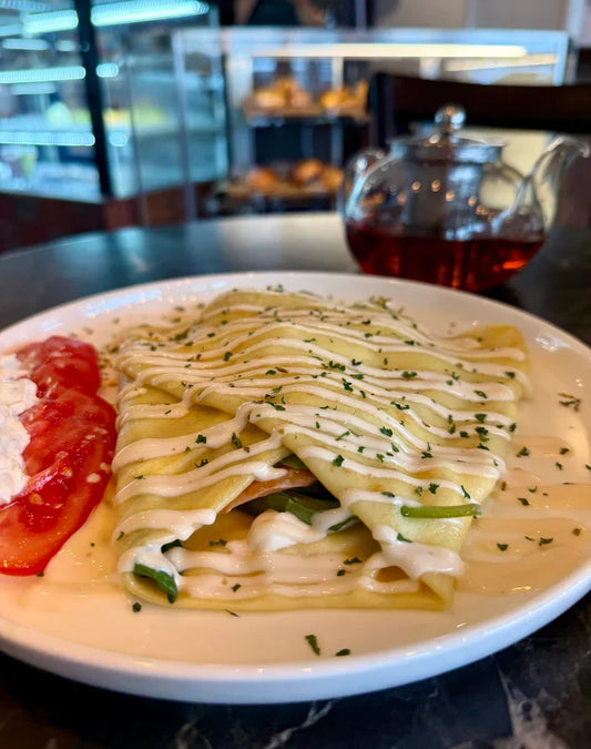 Savory crepe with fresh tomato and tea at Forest Vibe Cafe in Downtown St. Petersburg Florida